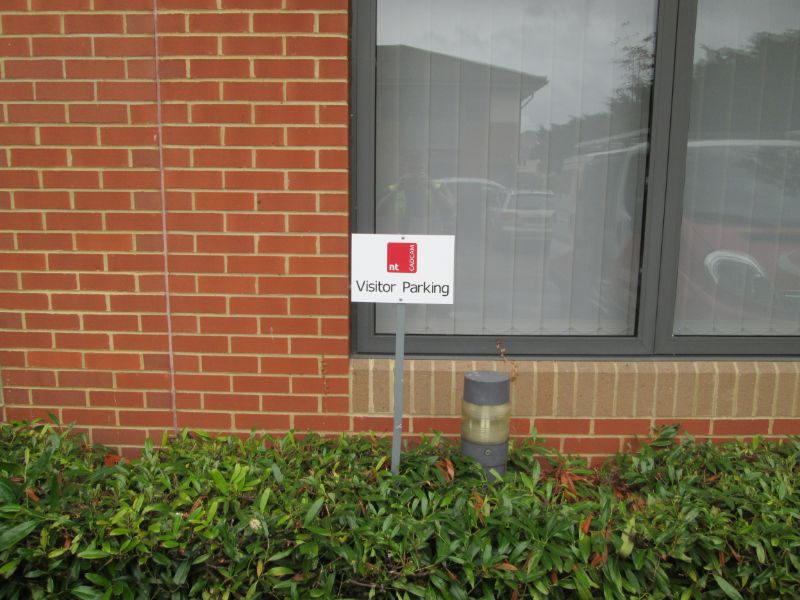 Small post mounted visitor parking sign