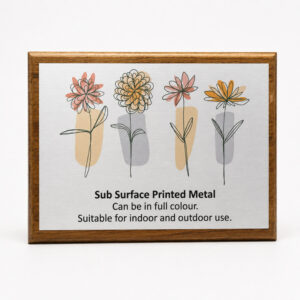 White_metal_plaque_oak_plinth